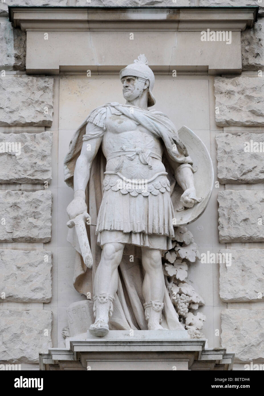Vienna, Austria. Heldenplatz. Stone statue on the facade of the Neue Burg: Roman Legionary (by Wilhelm Seib) Stock Photo