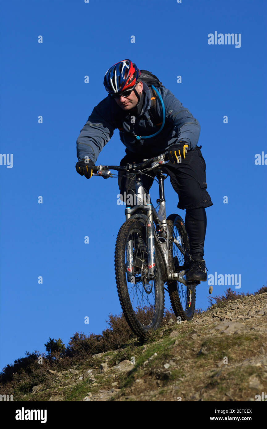 Bike riding down a hill hires stock photography and images Alamy