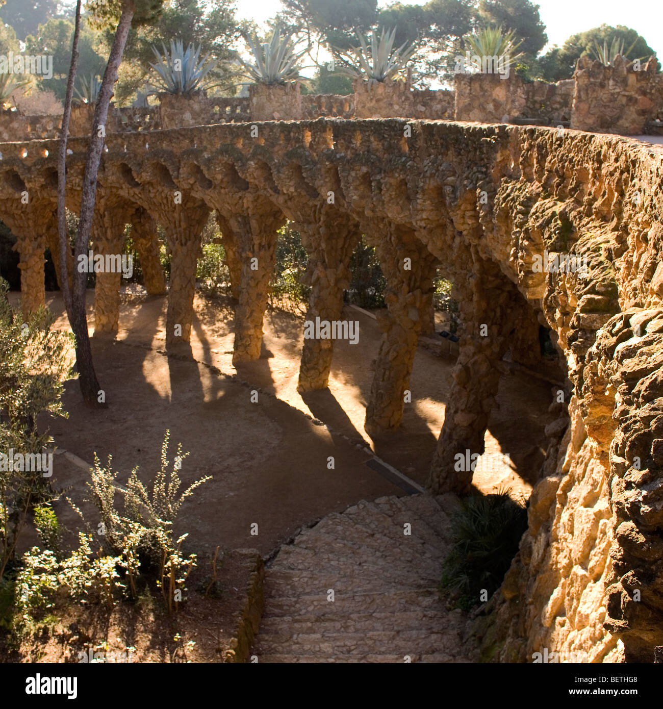 The stone arches in the sunlight at Parque Guell. Stock Photo