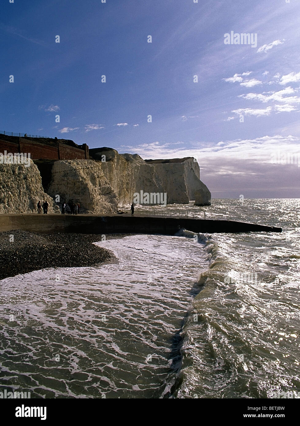 Chalk cliffs rise 300 feet to the East of the town of Seaford on the East Sussex coast Stock Photo