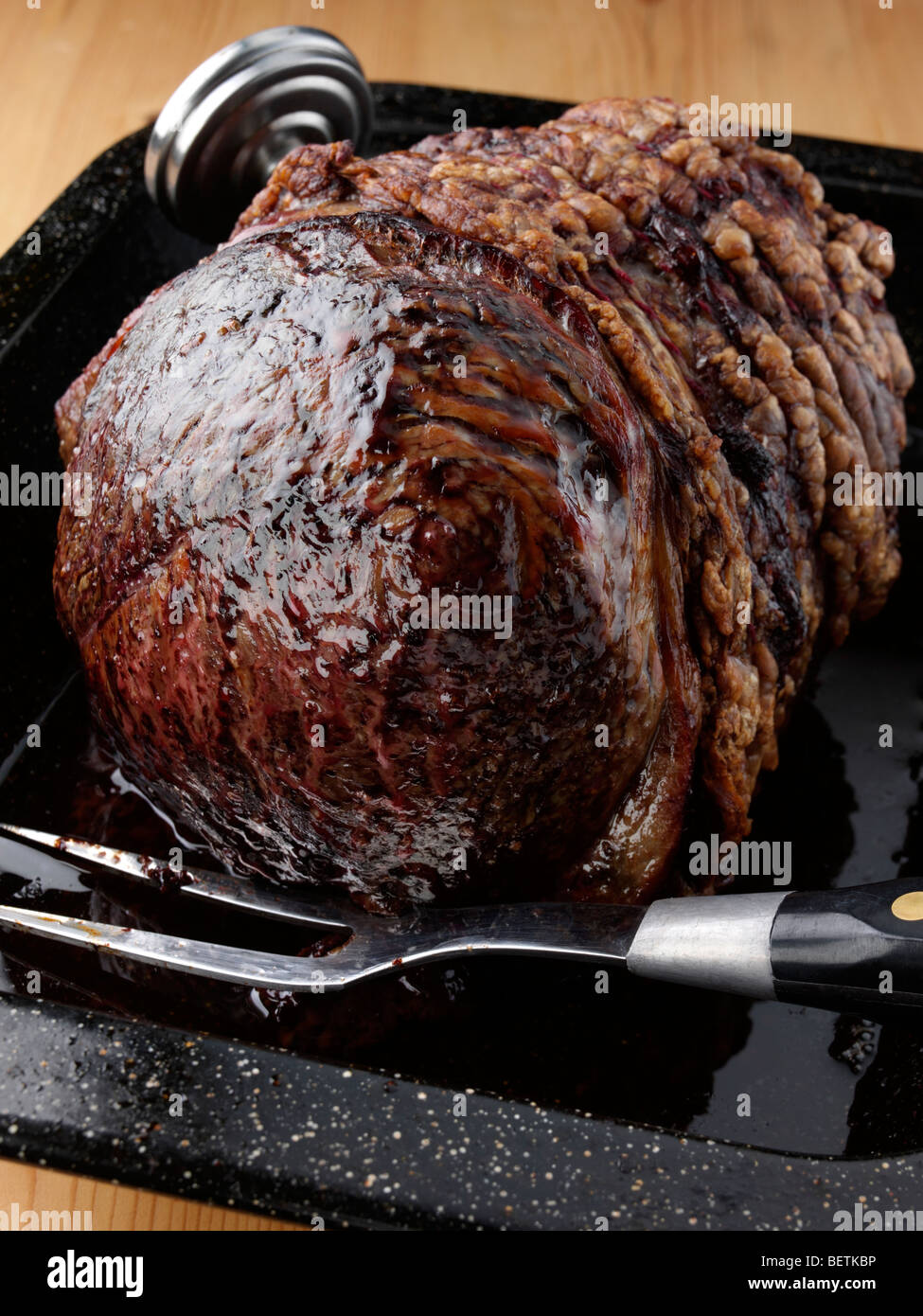 Whole topside joint of Irish beef in a roasting tin Stock Photo Alamy