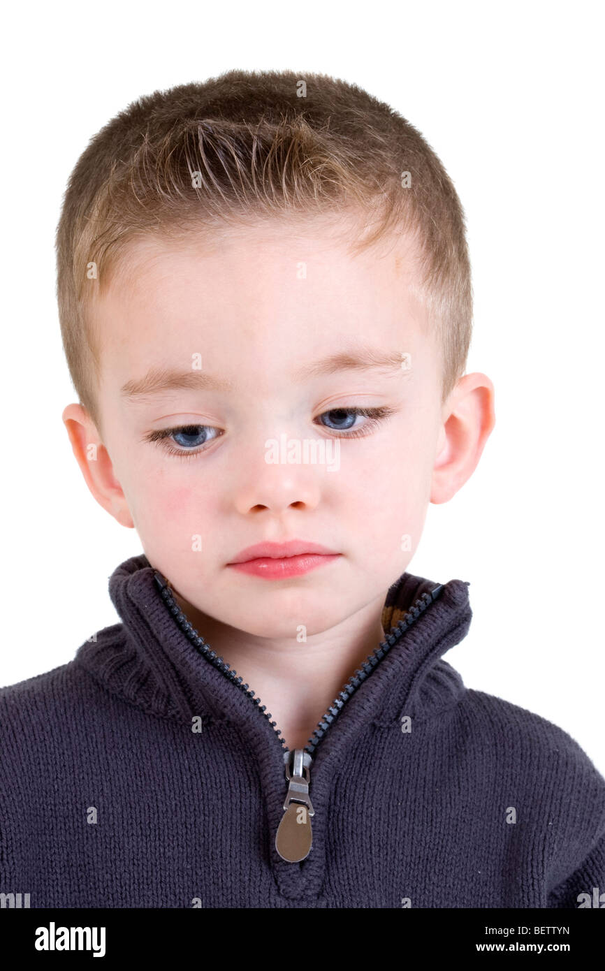 Portrait of a sad boy looking down Stock Photo Alamy