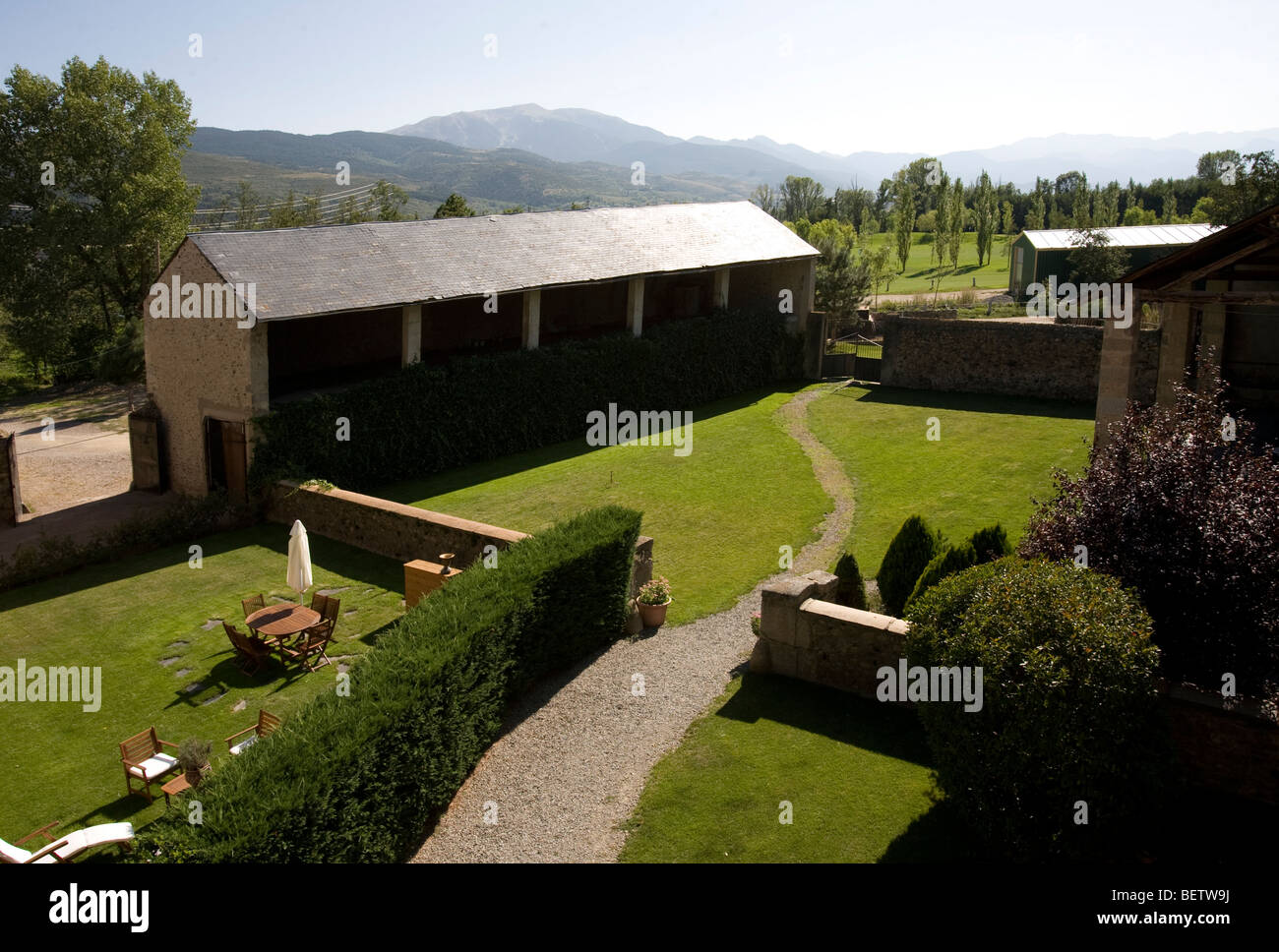 Back yard of a country hotel at Puigcerda, next to the Pyrenees in Spain. Stock Photo