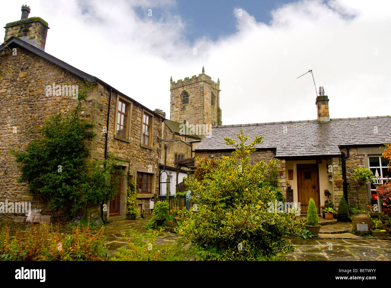 Typical Cottages in Waddington with the St Helen's church in the Ribble Valley in  Lancashire England Stock Photo