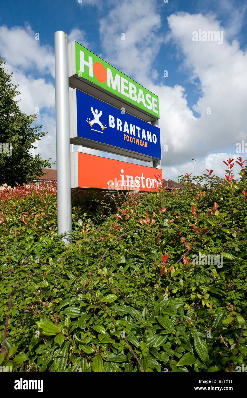 Shop signs at the entrance to a retail park in Market Harborough