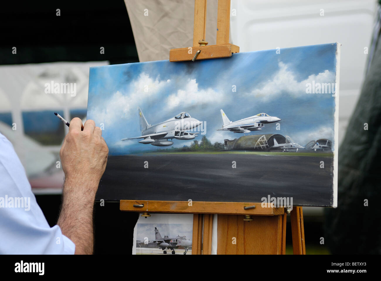 Artist making oil painting of Euro Fighter Typhoon aircraft Stock Photo
