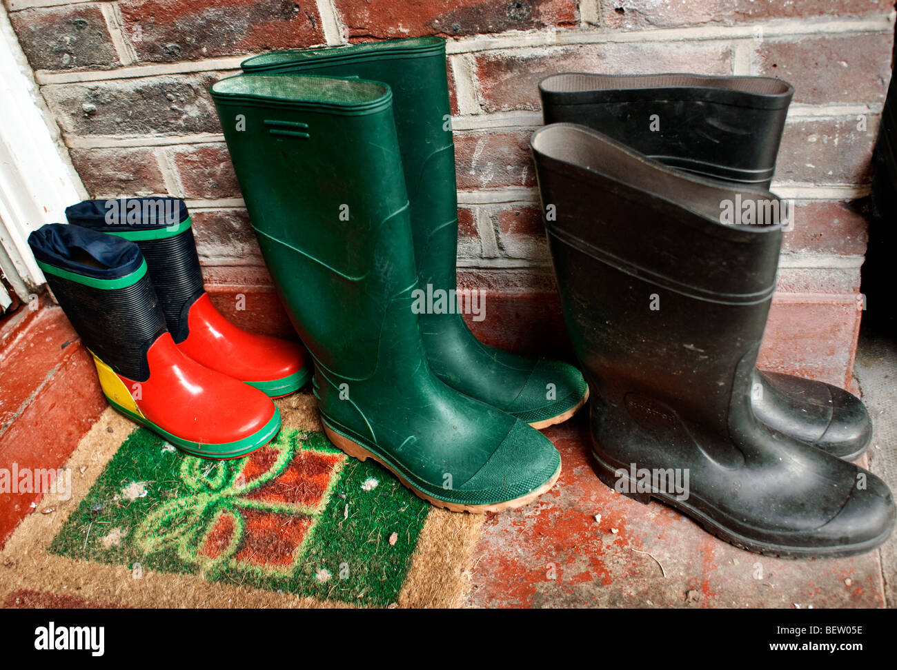 Three pairs wellington boots hi-res stock photography and images - Alamy