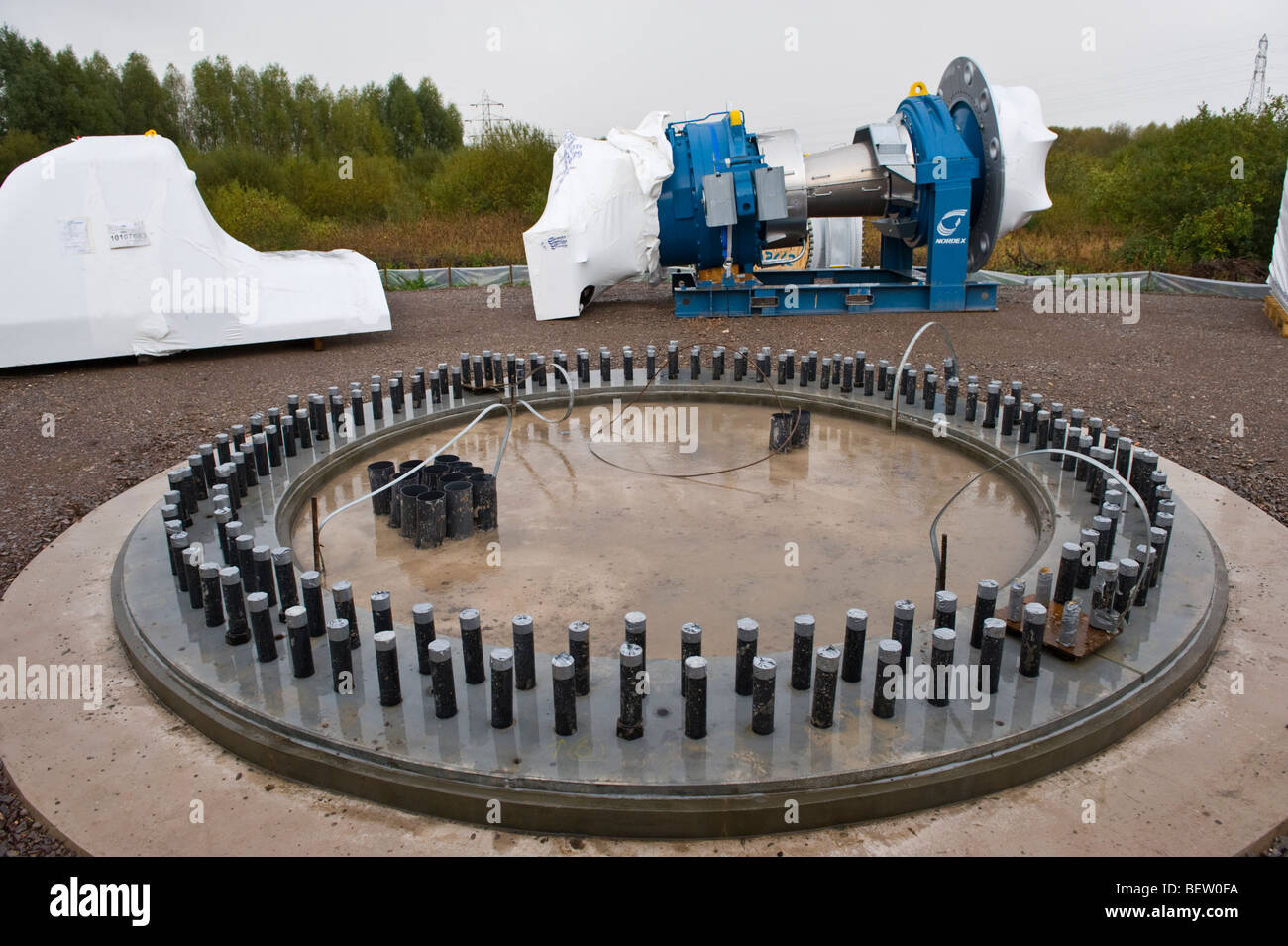Concrete base with fixings for Nordex N90 wind turbine under construction at Solutia UK Ltd Newport South Wales UK Stock Photo