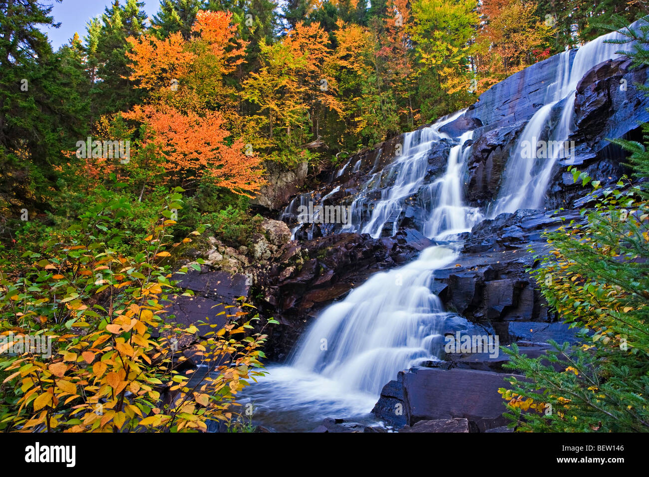 Chutes aux Rats,waterfall,surrounded by fall colours in Parc national du Mont Tremblant,a Provincial Park of Quebec,Laurentides, Stock Photo