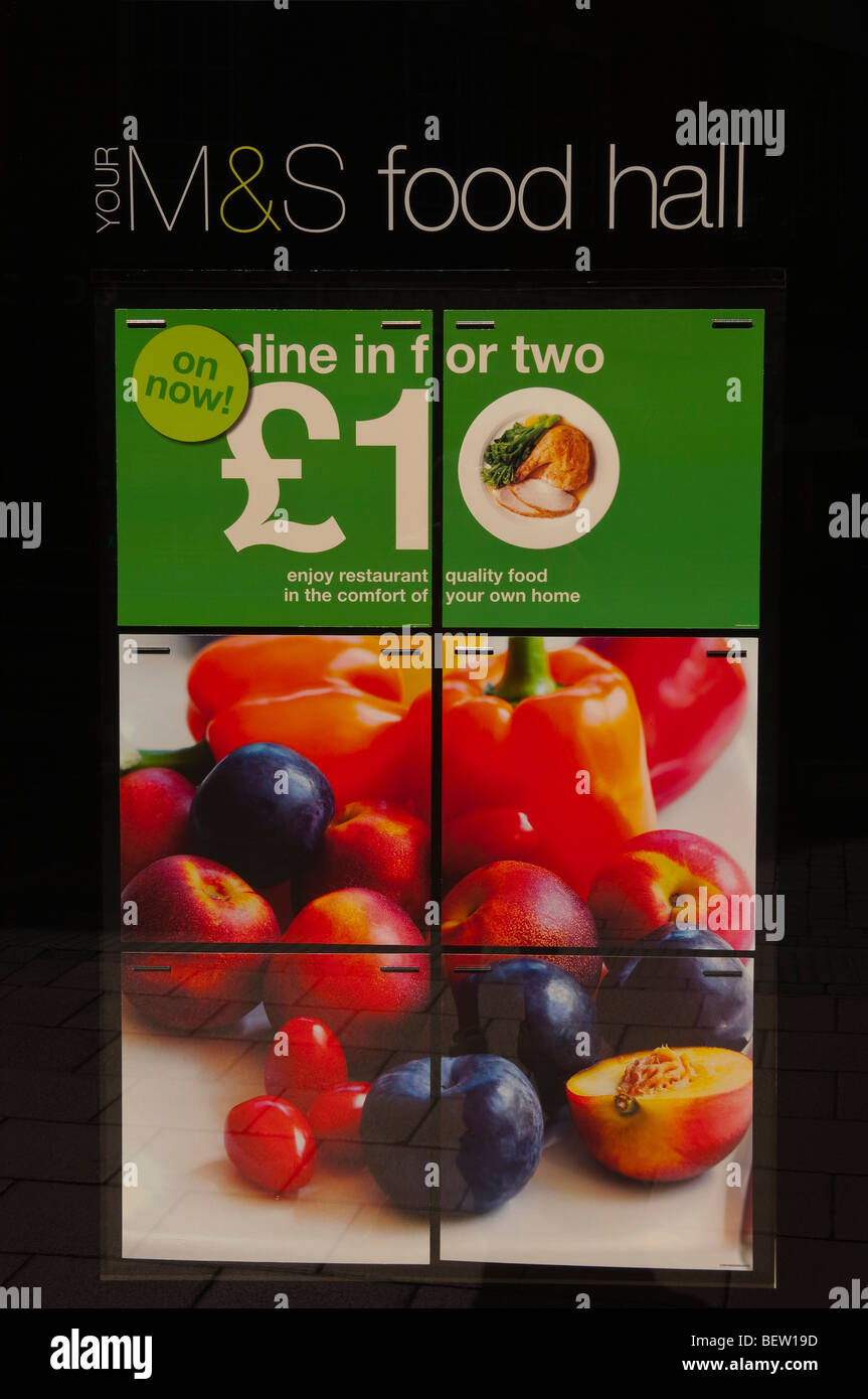 A sign advertising the M&S food hall offers in the Uk Stock Photo