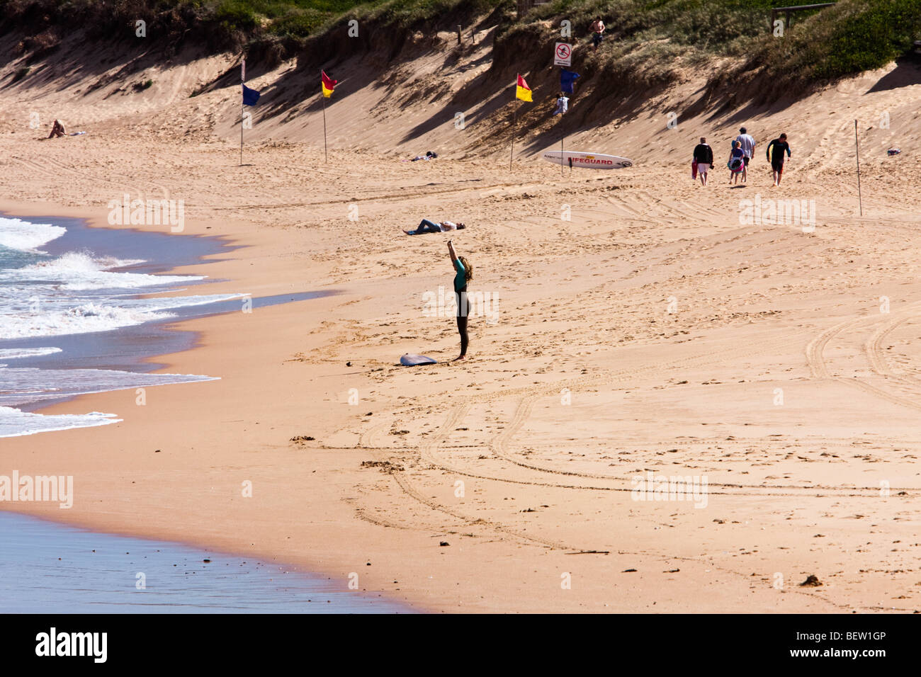 Surf life saving flags on North Narrabeen Beach Stock Photo Alamy