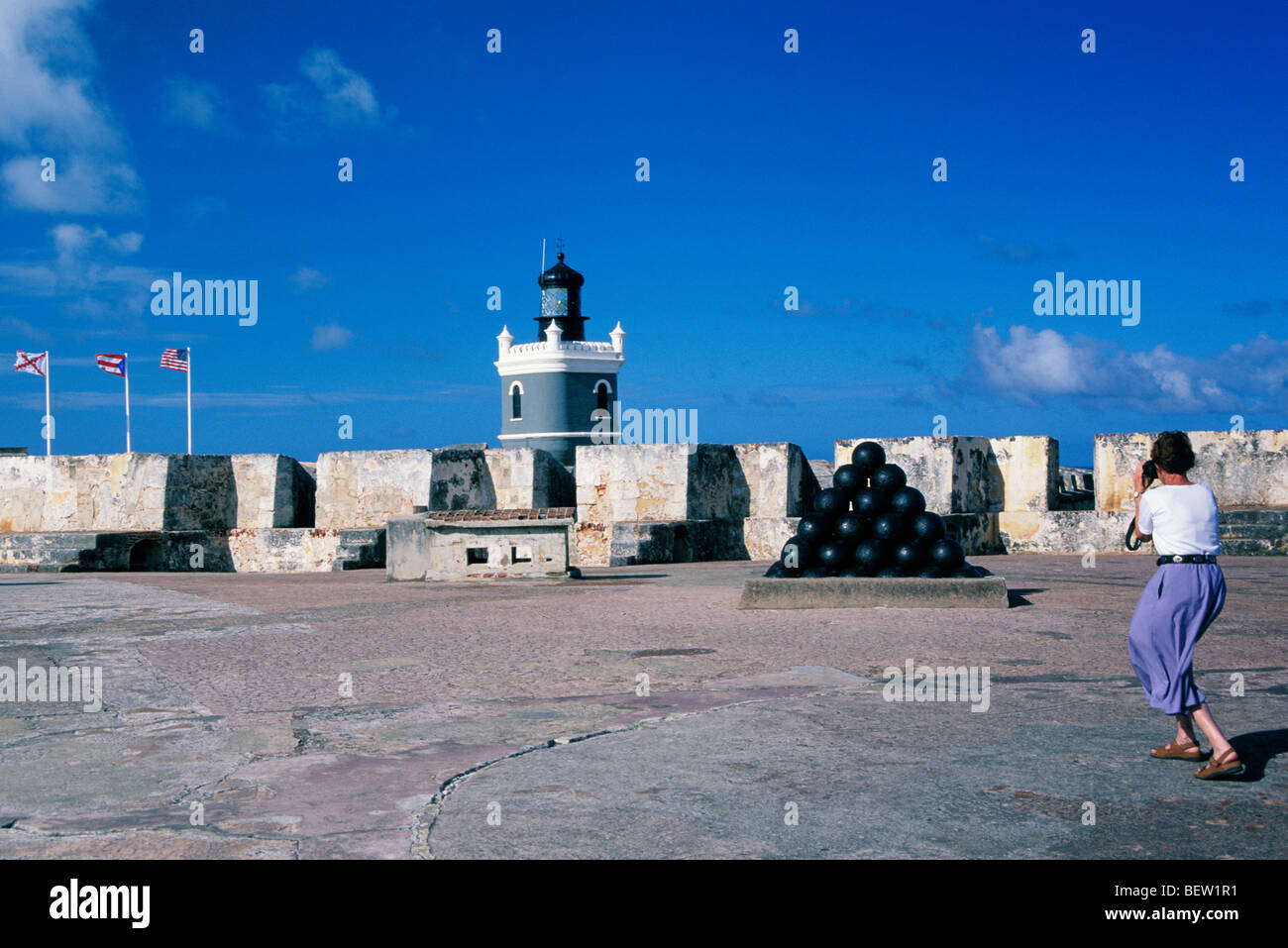 Visitor photographing and historic fortress, San Juan National Historic Site, Old San Juan, Puerto Rico. Stock Photo
