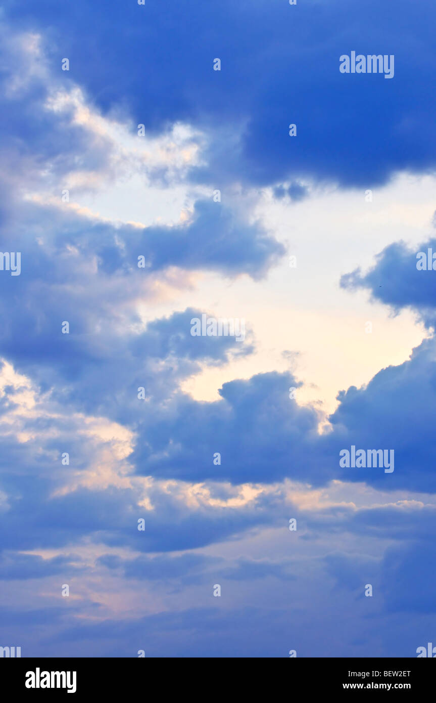 Stormy sky with sun shining through clouds Stock Photo - Alamy