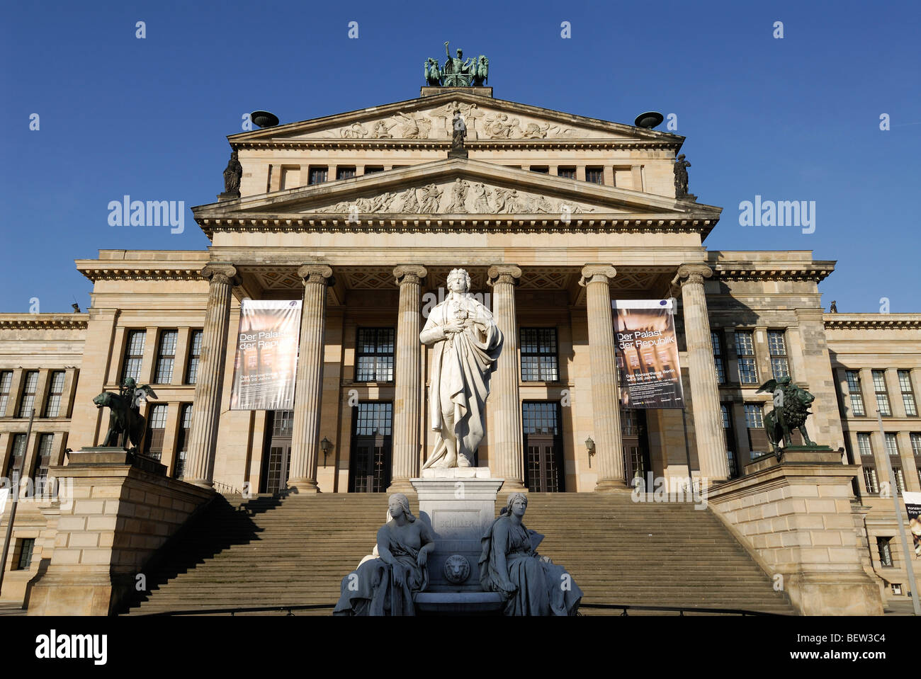 Berlin. Germany. Statue of Friedrich Schiller and the Konzerthaus on Gendarmenmarkt. Stock Photo