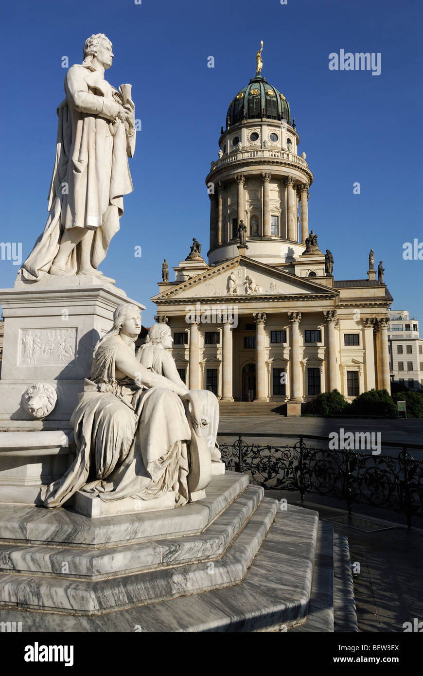 Berlin. Germany. Gendarmenmarkt. Statue of Friedrich Schiller and the French Cathedral Französischer Dom. Stock Photo