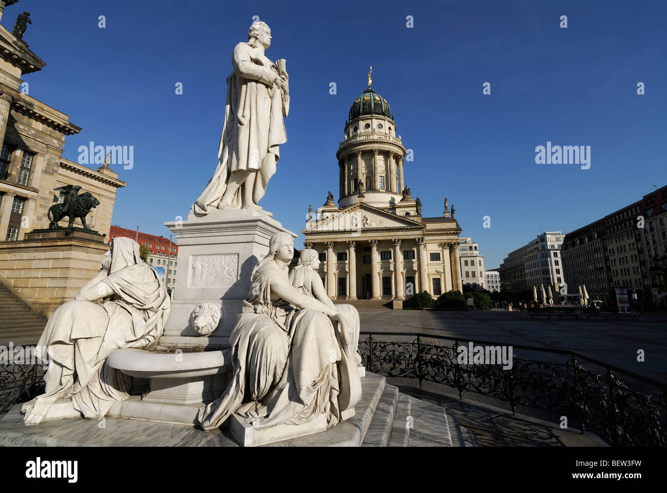 Berlin. Germany. Gendarmenmarkt. Statue of Friedrich Schiller and the French Cathedral Französischer Dom. Stock Photo