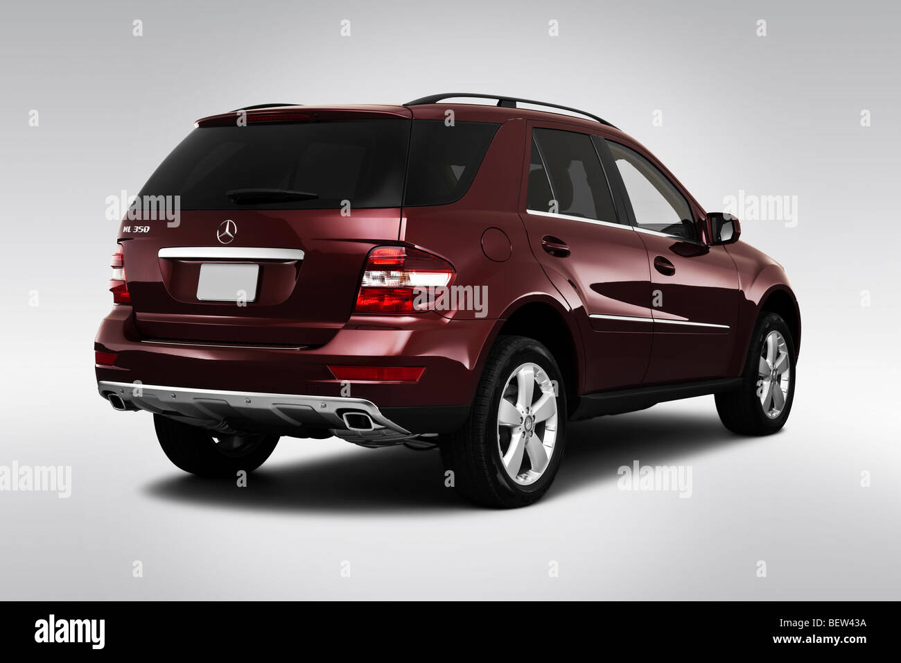 2010 Mercedes-Benz M-Class ML350 in Red - Rear angle view Stock Photo -  Alamy