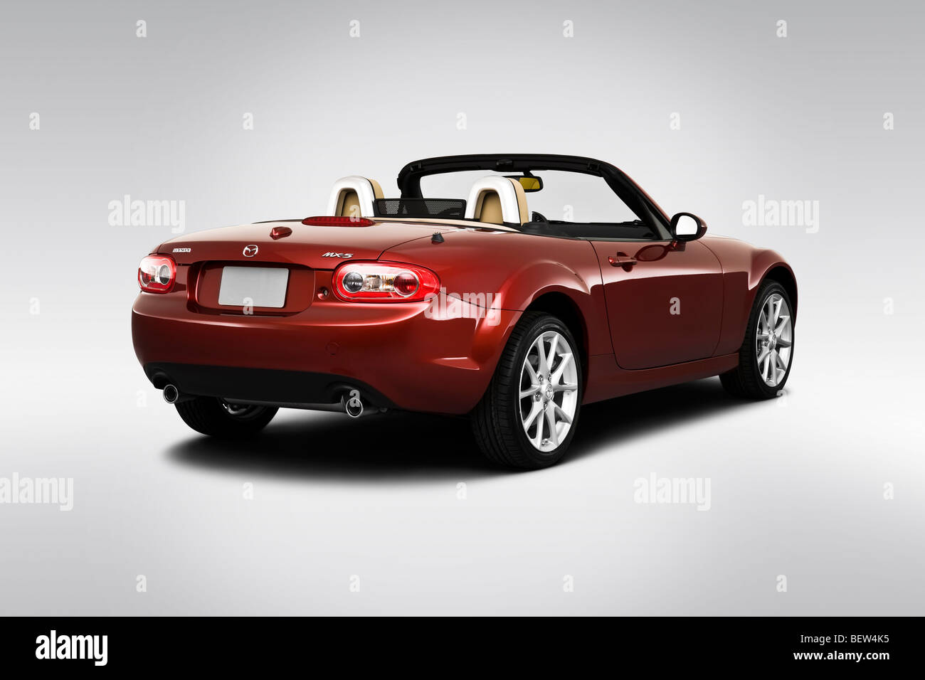 2010 Mazda MX-5 Grand Touring in Red - Rear angle view Stock Photo