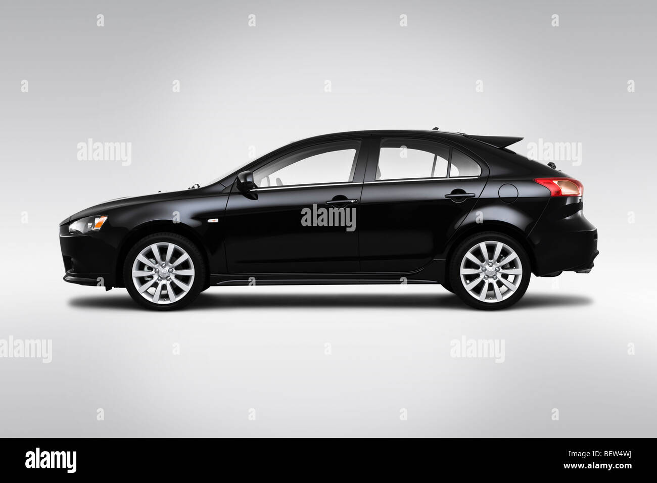 2010 Mitsubishi Lancer Sportback Ralliart in Black - Drivers Side Profile Stock Photo