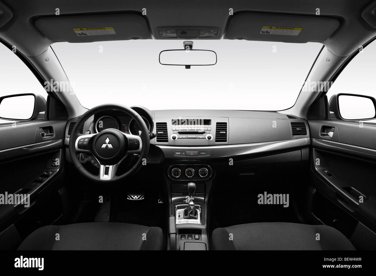 2010 Mitsubishi Lancer Sportback Ralliart in Black - Dashboard, center console, gear shifter view Stock Photo