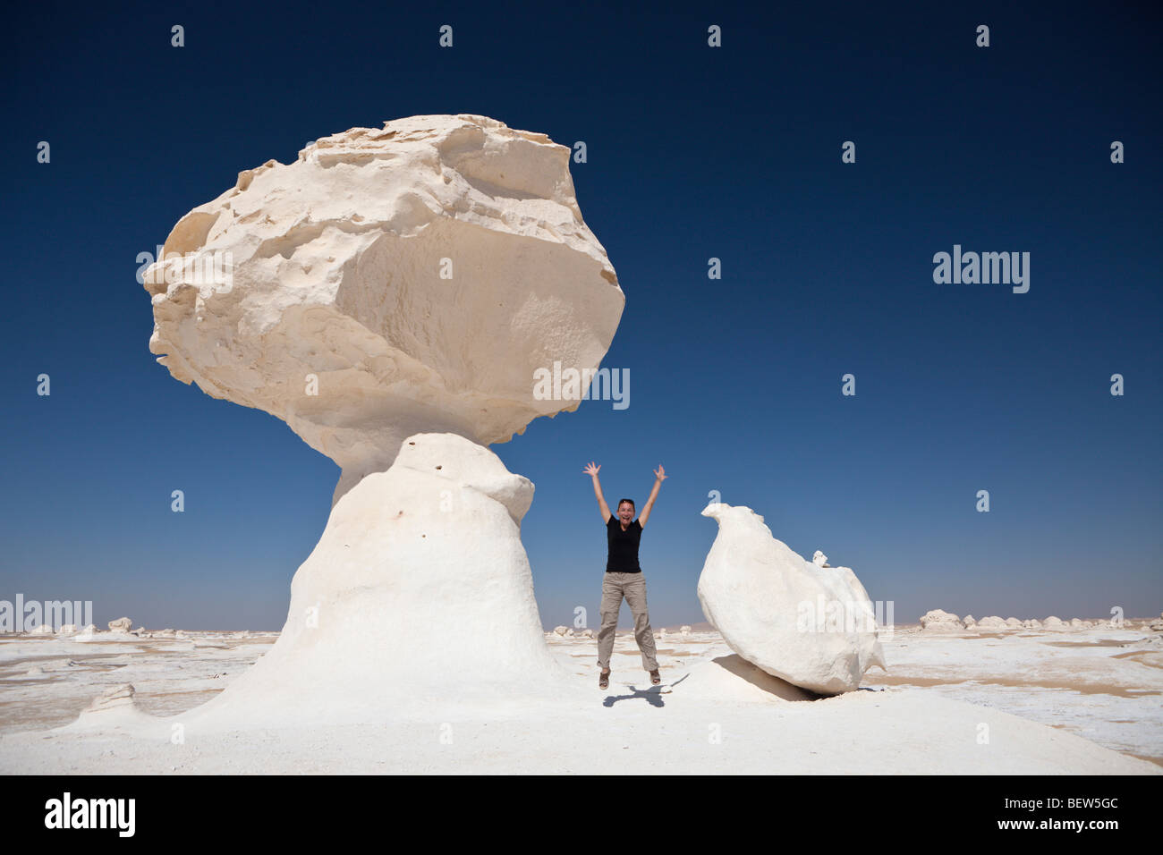 Tourist in White Desert National Park, Libyan Desert, Egypt Stock Photo