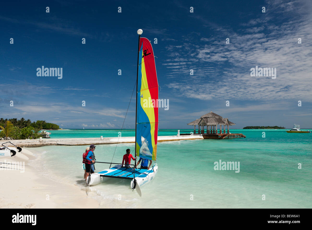 Catamaran on Beach of Maldive Island Kandooma, South Male Atoll, Maldives Stock Photo