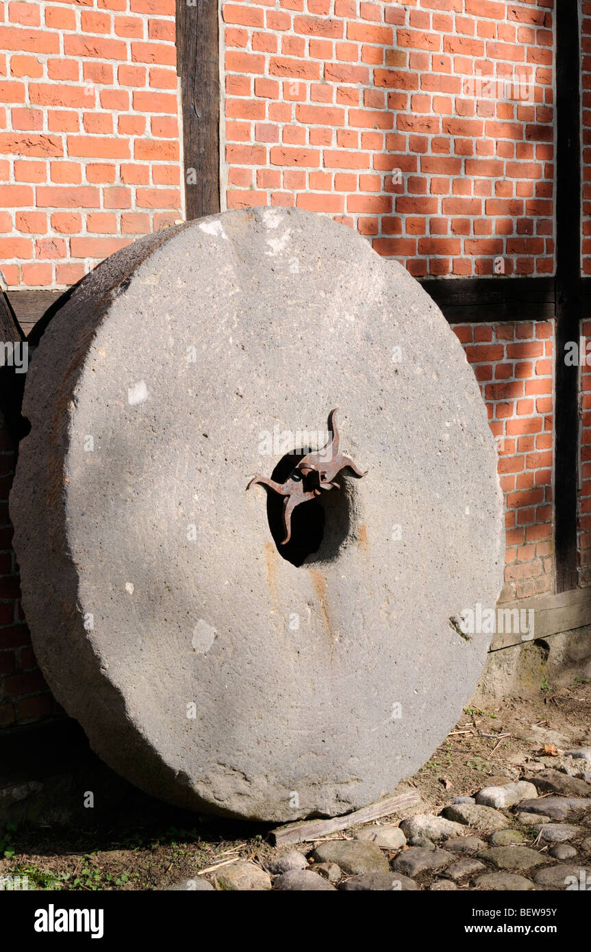 Alter Mühlstein. - Old mill stone. Stock Photo