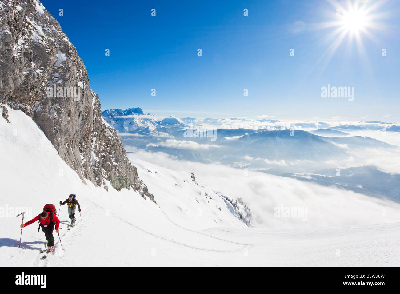 two men ski touring in the mountains, Salzburg, Austria, high angle view Stock Photo