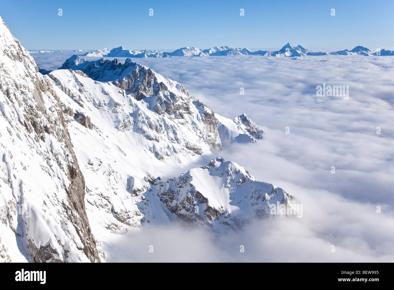 Mountaintops surrounded by clouds and fog, Styria, Austria, high angle view Stock Photo