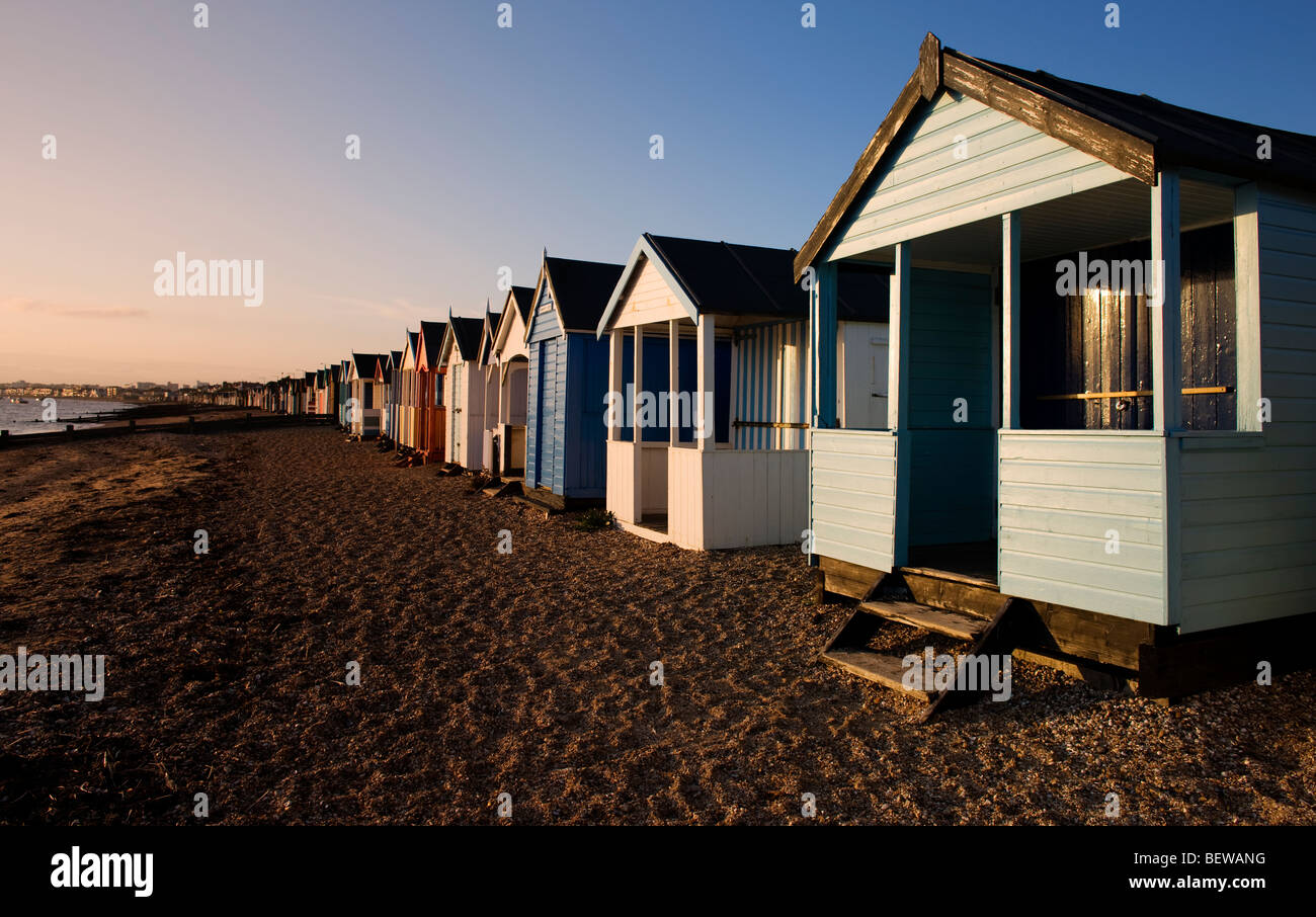 Beach huts on the stoney beach at Shoeburyness in the late autumn