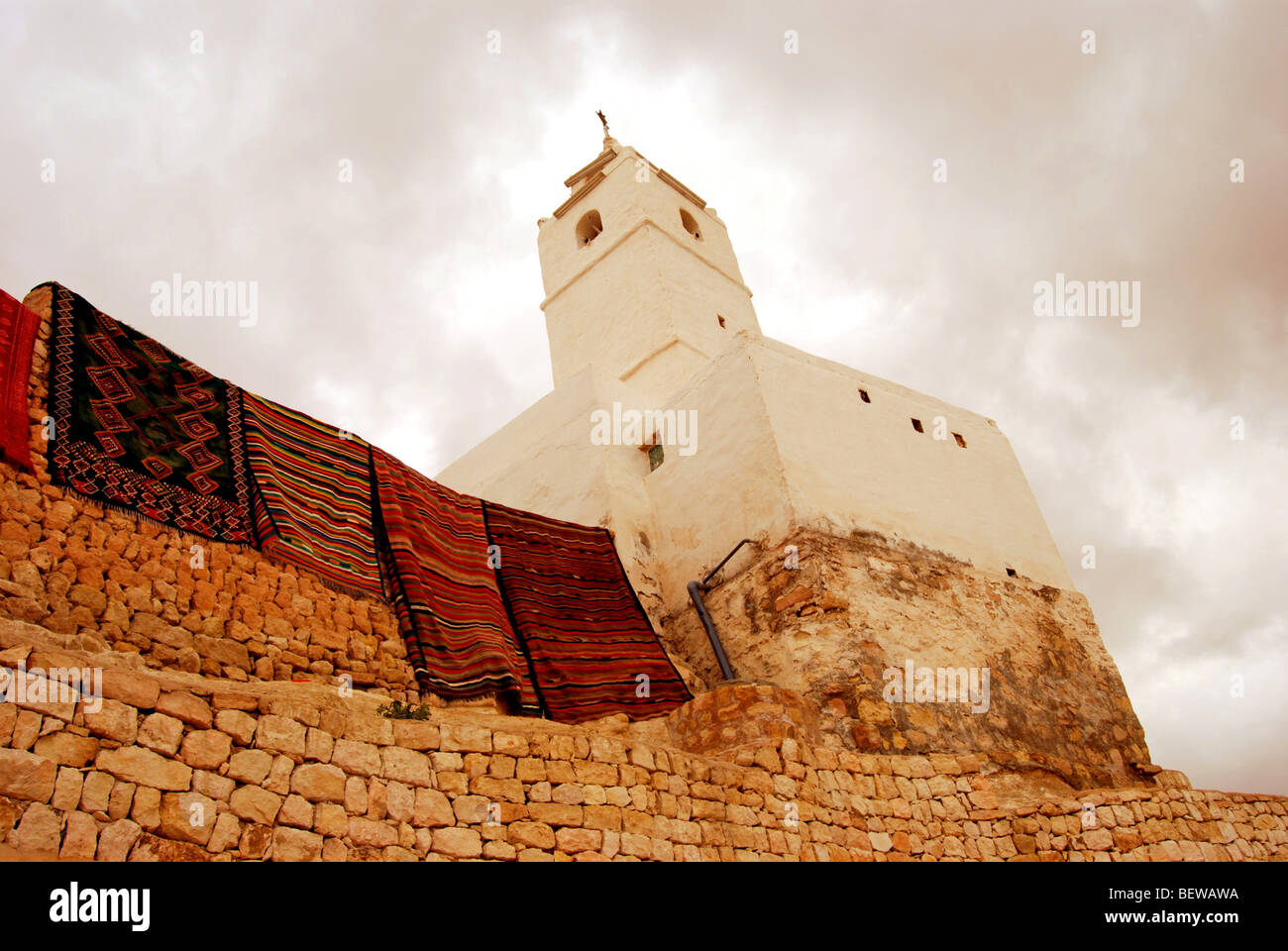 Minaret at the tunisian desert town of Chenini, view from below Stock Photo