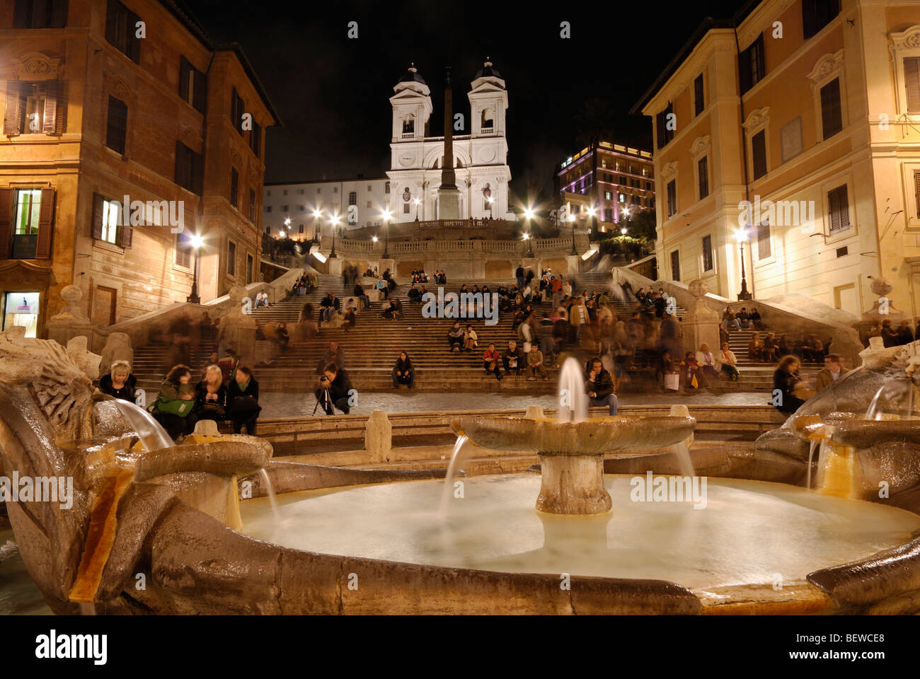 The Fountain of the Old Boat (Fontana della Barcaccia) in front of the Spanish Steps at night, Rome, Italy Stock Photo