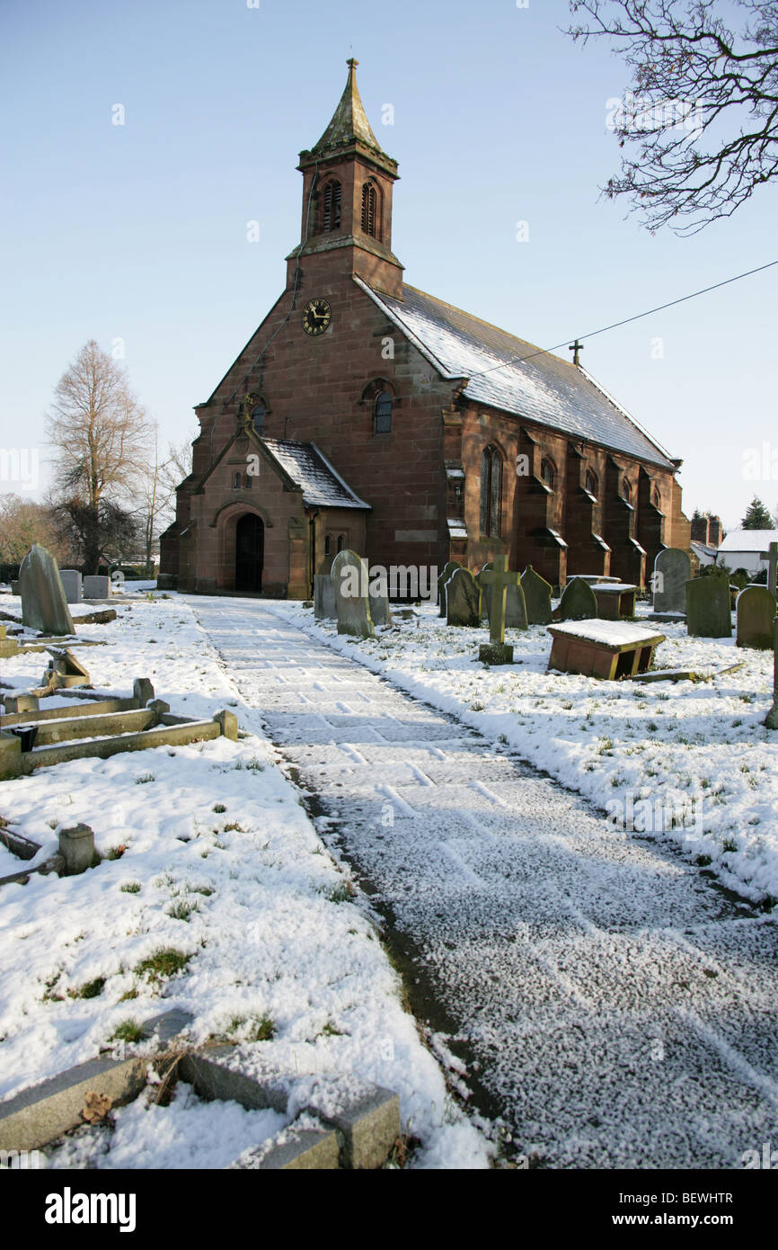 Village of Coddington, England. Winter snowy view of the 19th century