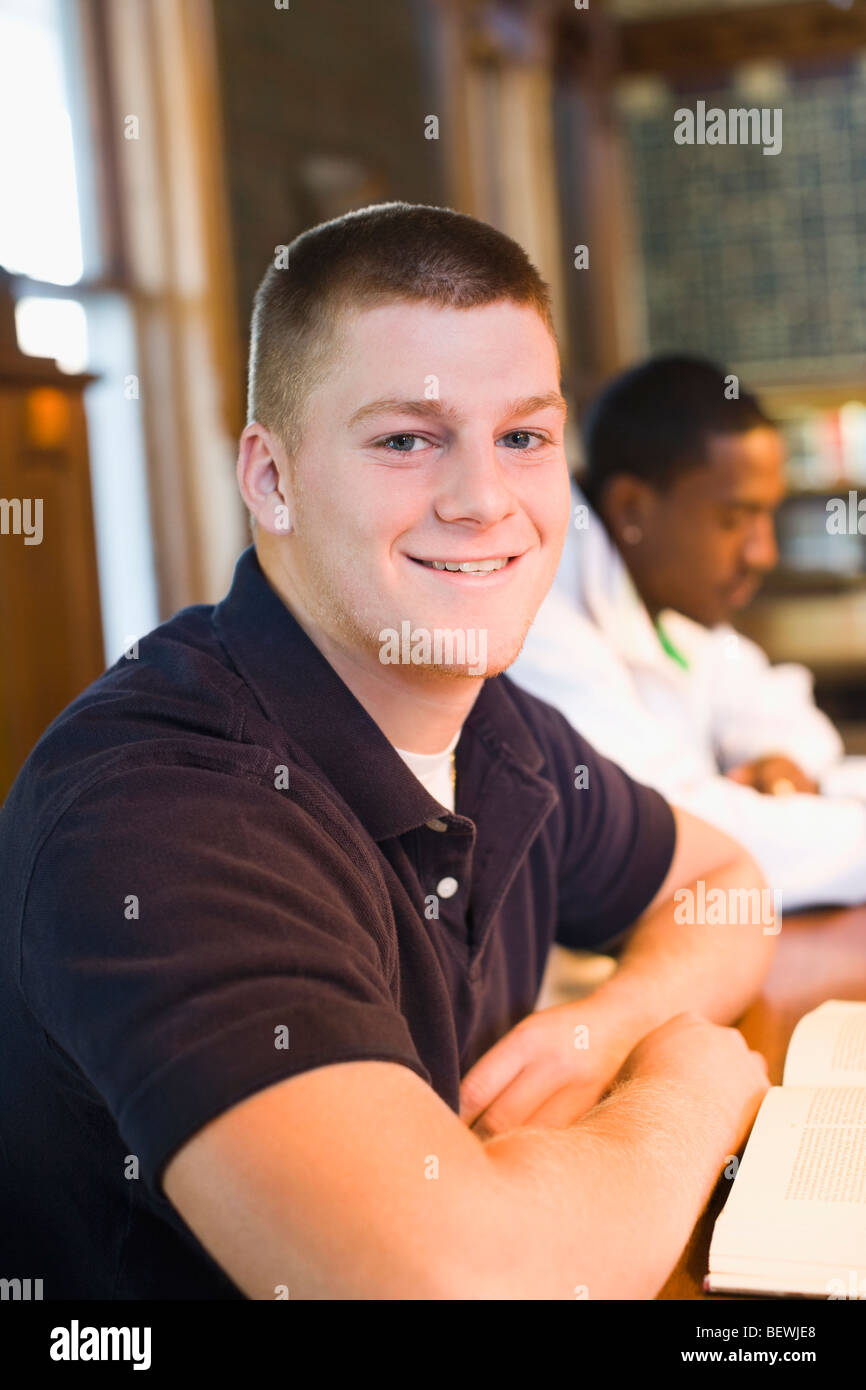 Portrait student in library hi-res stock photography and images - Alamy