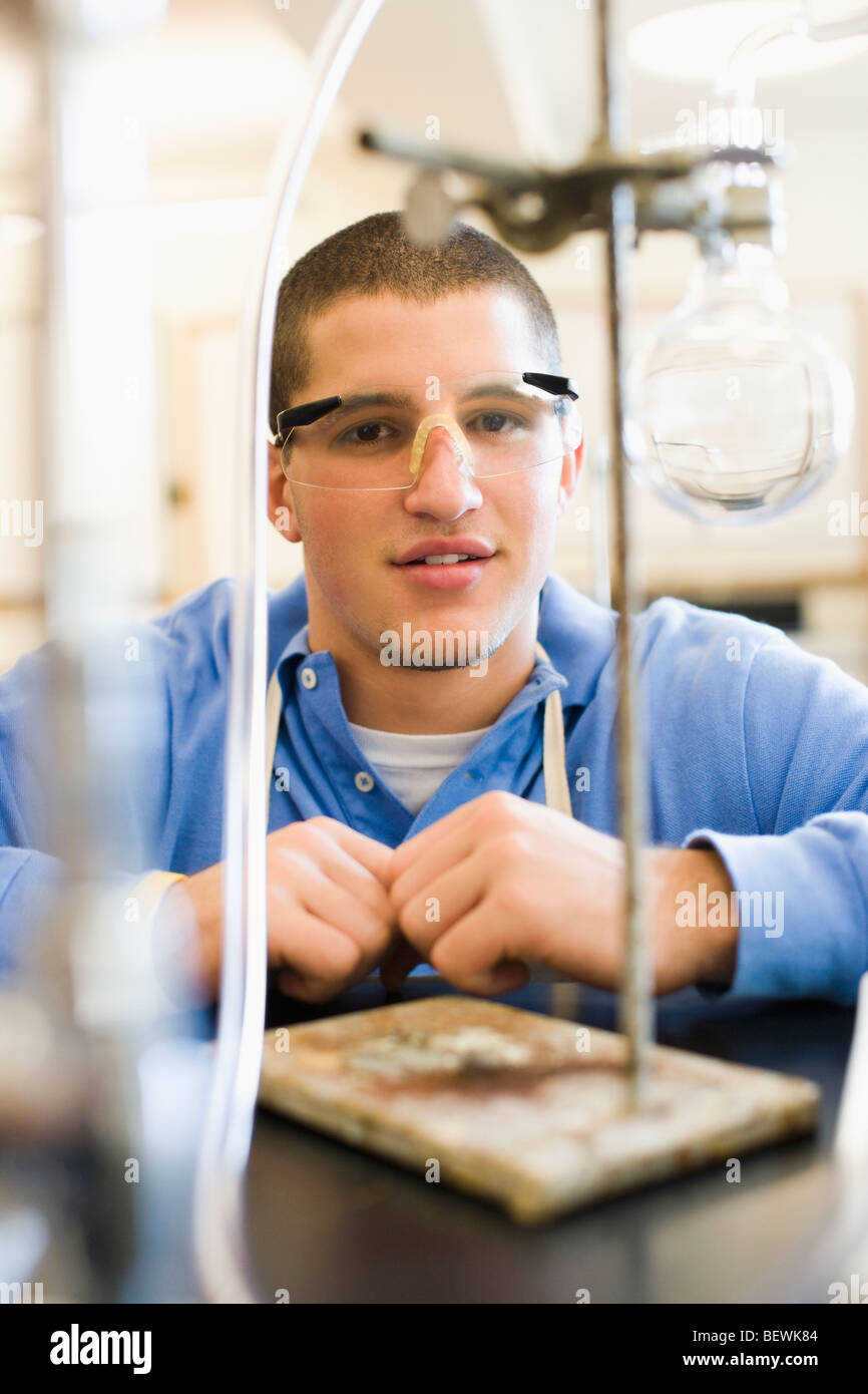 Student doing a scientific experiment in a laboratory Stock Photo Alamy