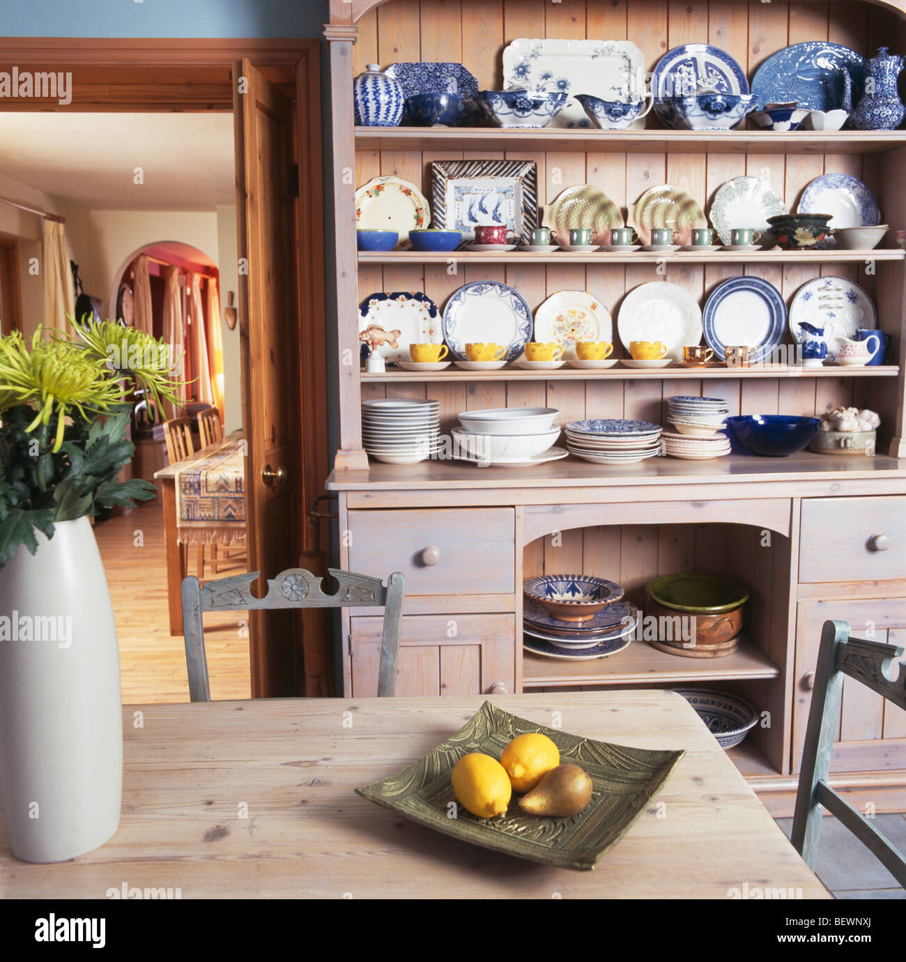 Collection Of Blue Crockery On Lime Washed Pine Dresser In Country