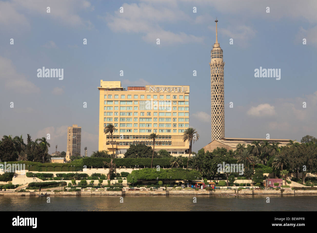 View across the Nile River to the Cairo Tower (right) and Novotel hotel - Cairo, Egypt. Stock Photo