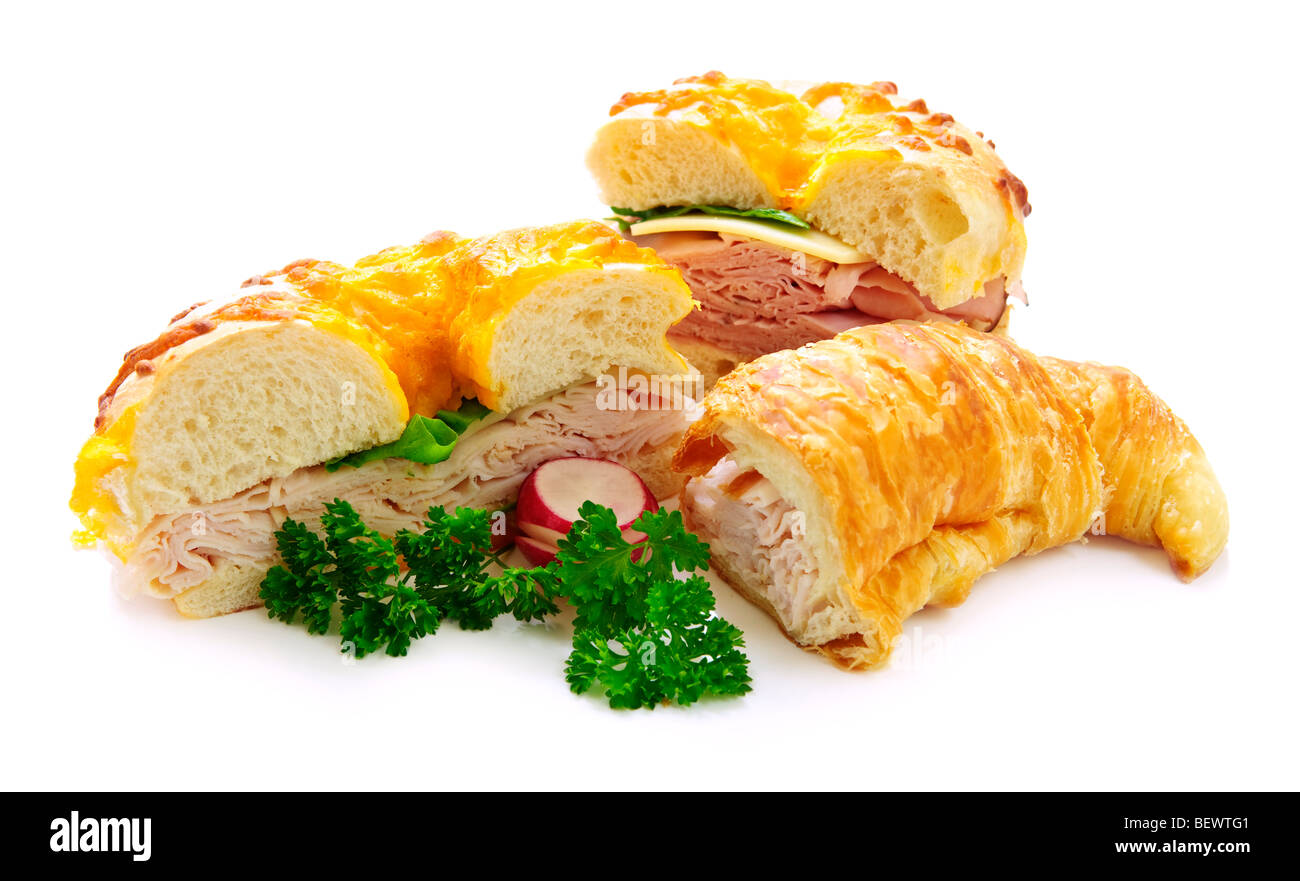 Assorted bagel and croissant sandwiches with meat and vegetables Stock Photo