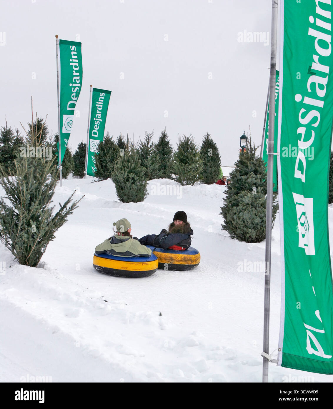 Sliding down tubing run at snow play park on Plains of Abraham during Winter Carnival, Quebec