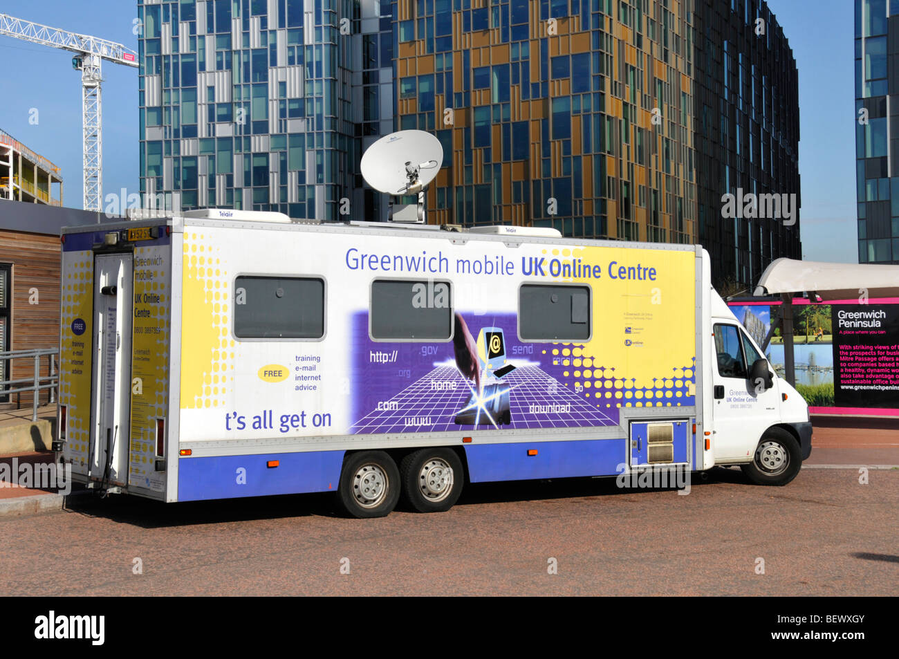 Greenwich Mobile UK Online Centre van parked near the o2 arena adjacent to new office developments Stock Photo