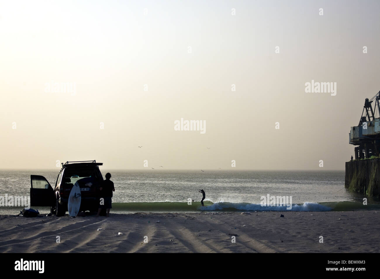 Mauritania, Nouakchott, evening surfing at the fishing pier Stock Photo