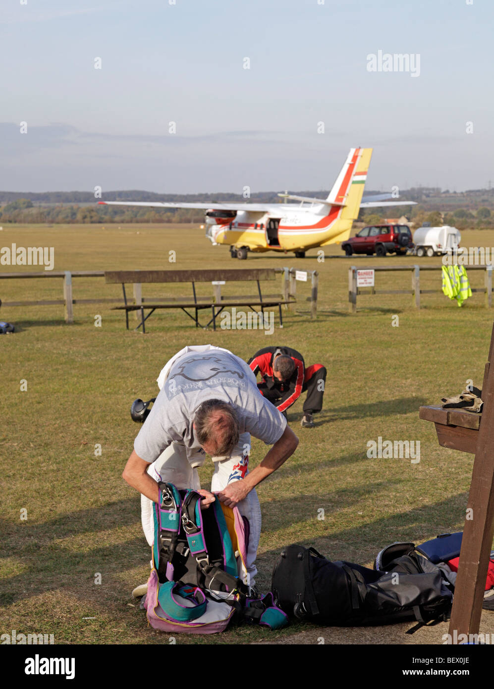 Skydivers packing their parachutes before a jump Stock Photo Alamy