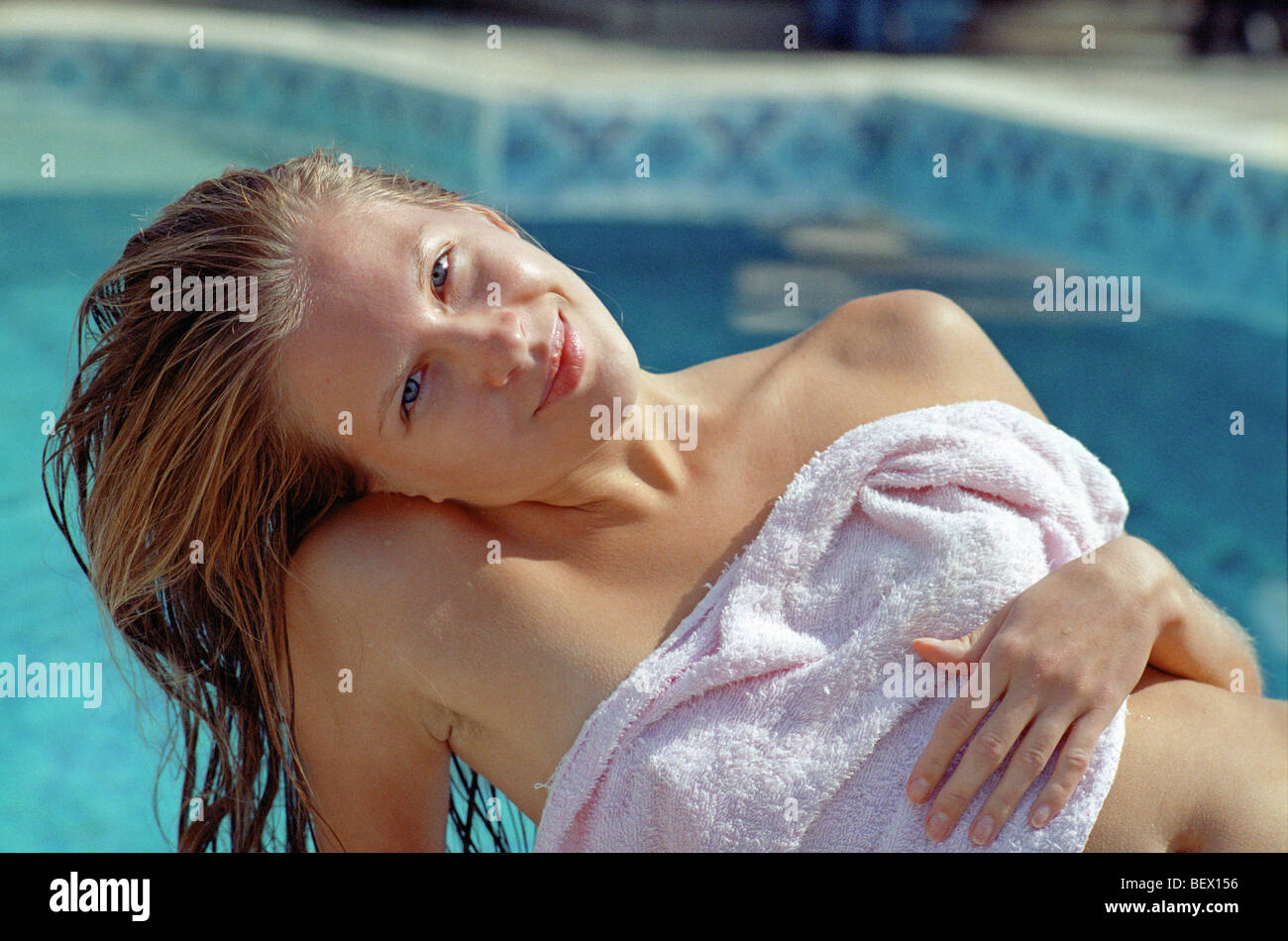 beautiful woman before water pool Stock Photo