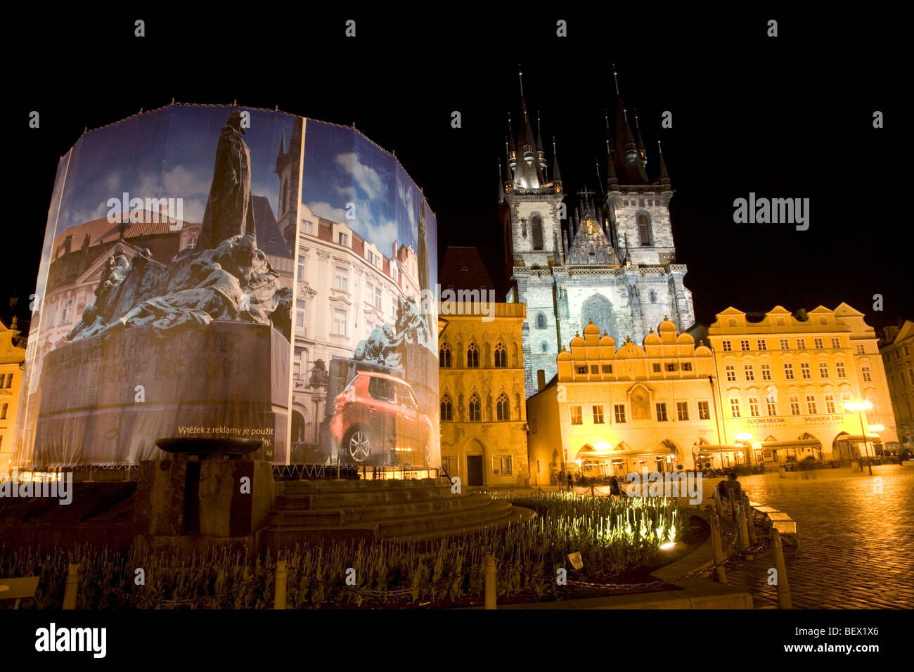 Night view of Jan Hus memorial statue restoration and Tyn Church, Old Town Square, Prague Stock Photo