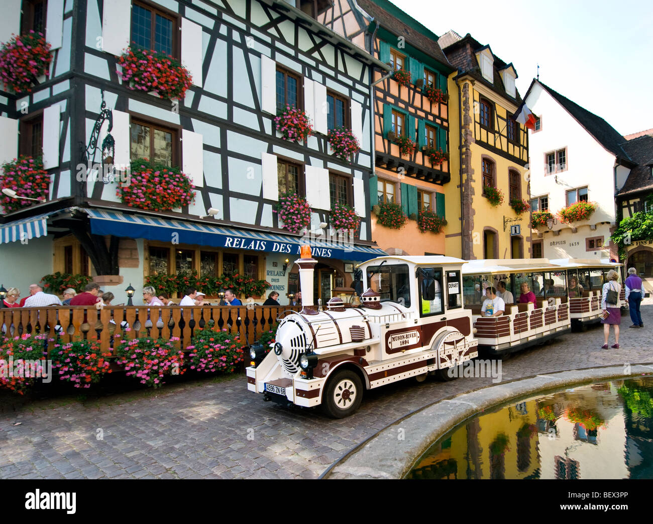 Village tour sightseeing tourist train in central historic medieval ...