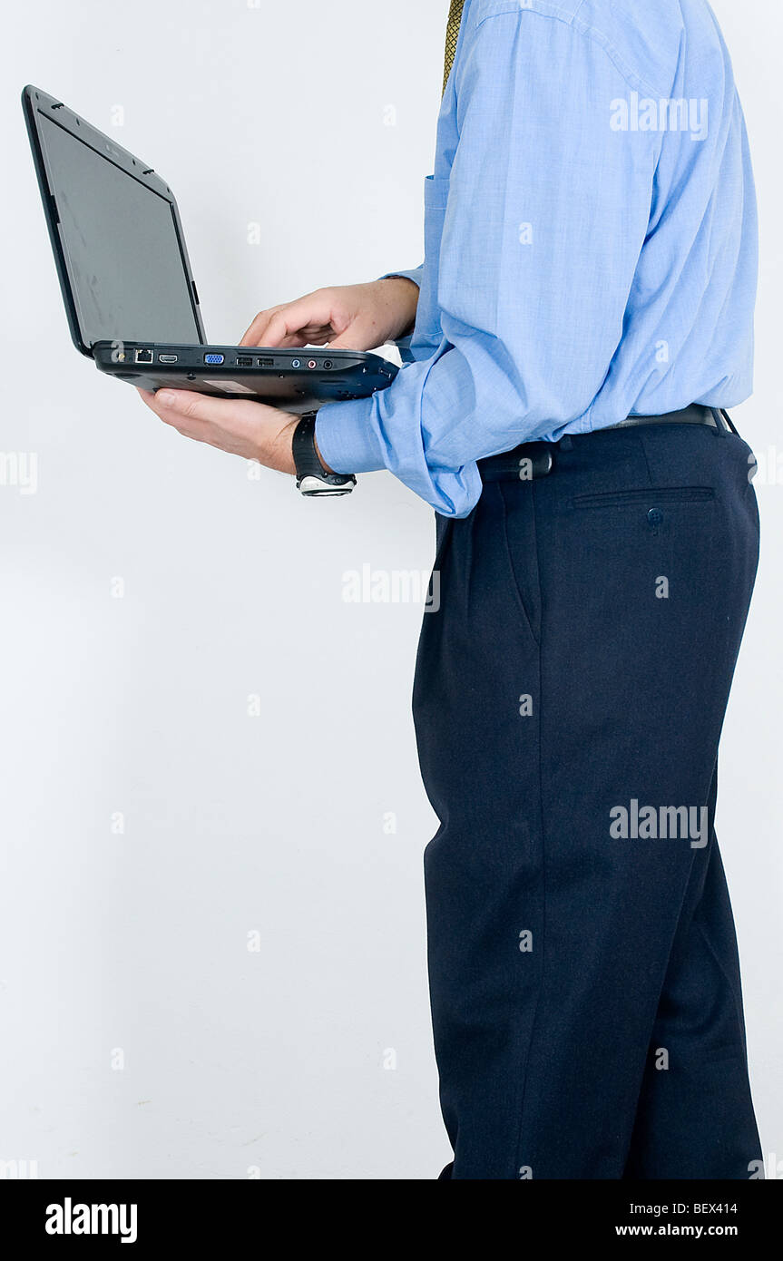 a man with laptop in hands Stock Photo - Alamy