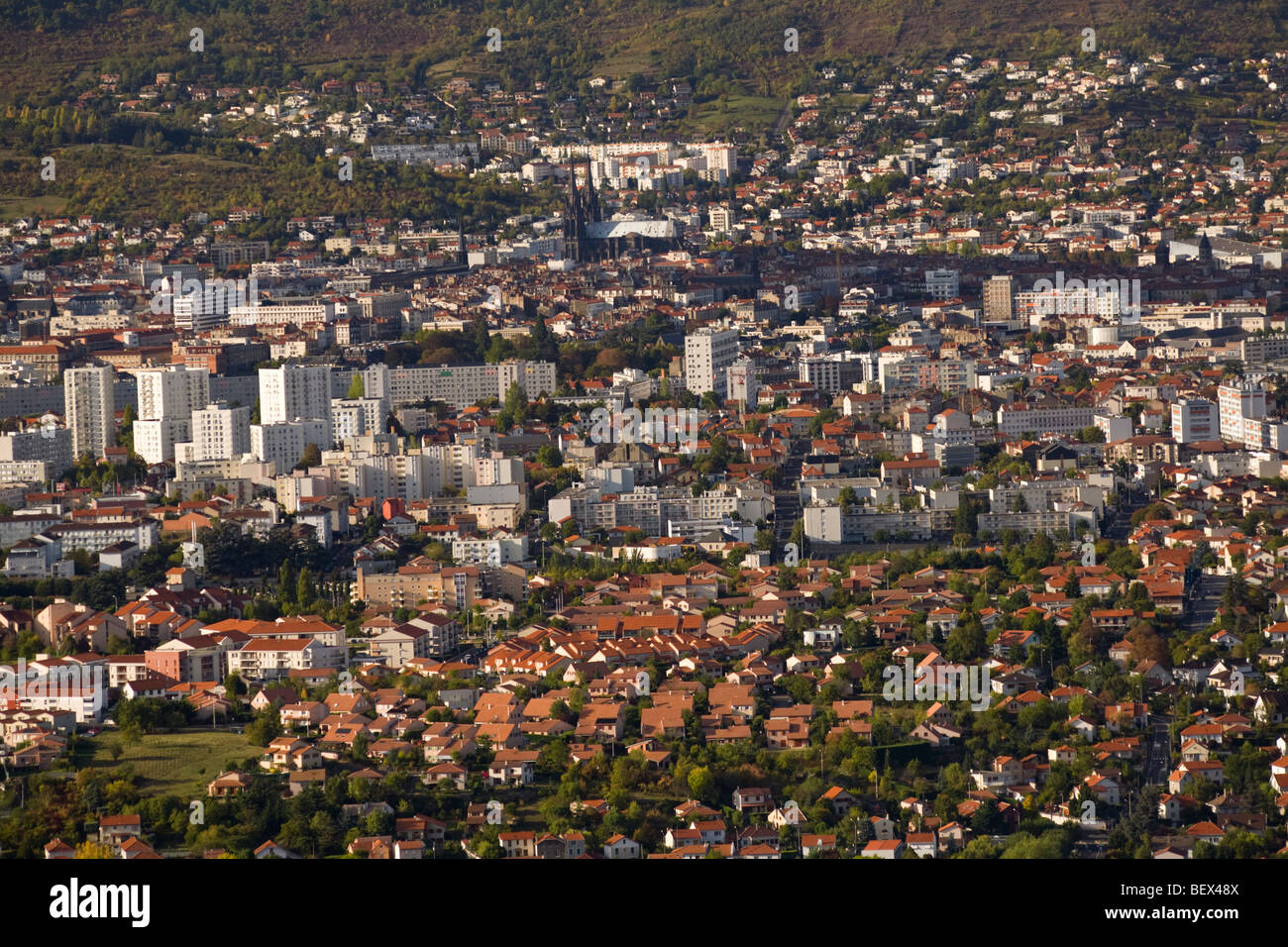 In the beginning of Autumn, an aerial view of Clermont-Ferrand (France). Vue aérienne de la ville de Clermont-Ferrand (France). Stock Photo