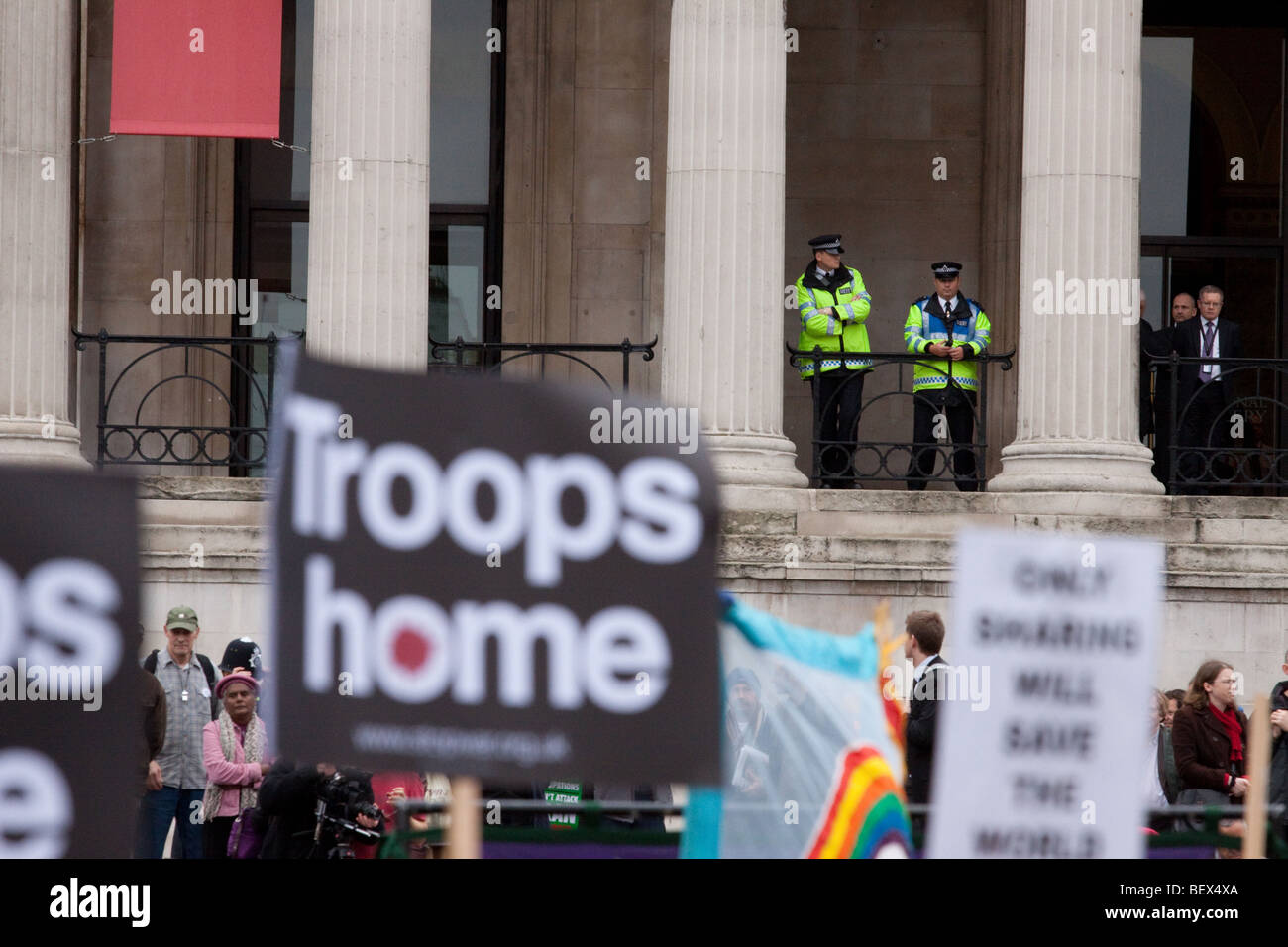 Police oversee anti war demonstration in Trafalgar Square, London Stock Photo