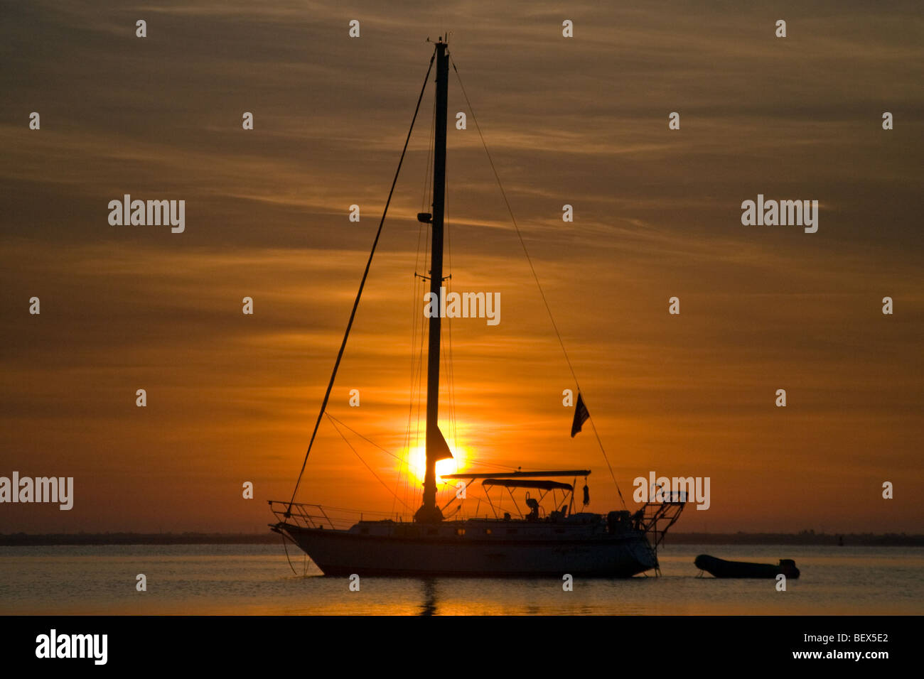 Boat sailing on bay sunset hi-res stock photography and images - Alamy