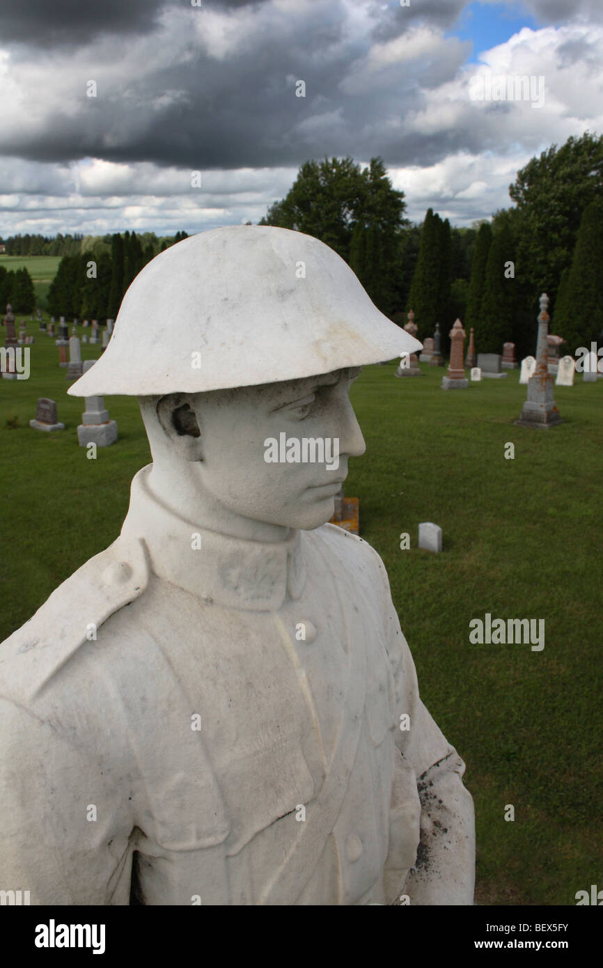 Statue of World War I Soldier in Rural Canadian Cemetery Stock Photo